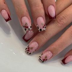 CTTHNBD square press-ons with French tip leopard cherry design for chic winter manicure.