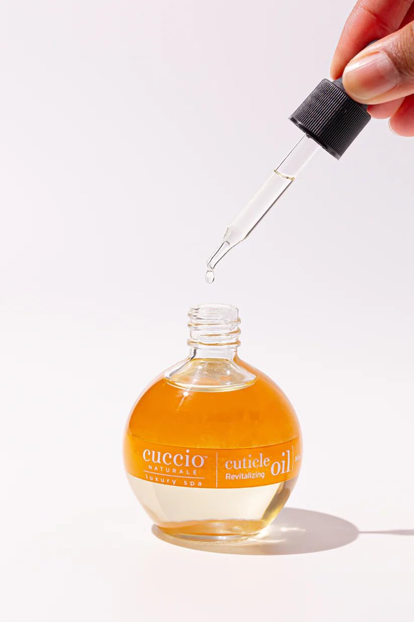 Lifestyle shot of Cuccio Naturale bottle for a luxurious at-home manicure.