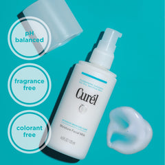 Close-up of milky texture from Curel Facial Milk on dry skin.