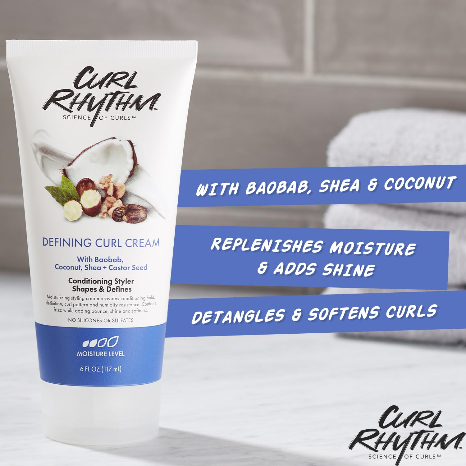 Close-up of ingredients including baobab oil and shea butter for moisture.