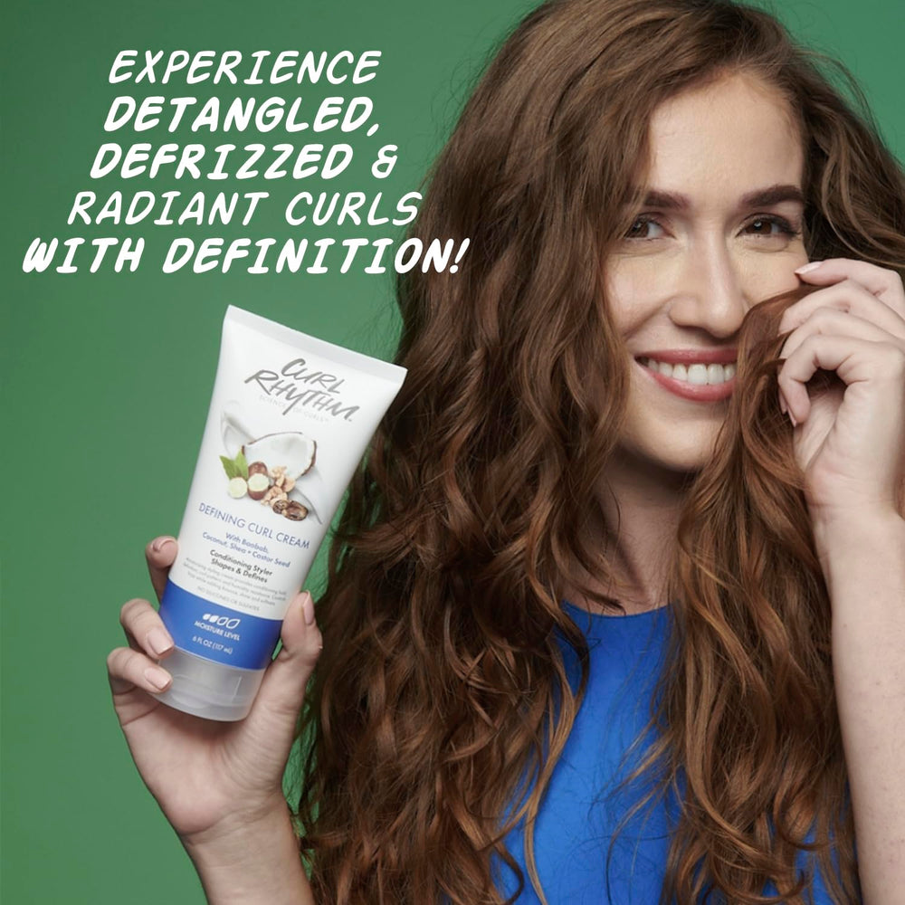 Creamy texture visible for frizz control and defined curl pattern.
