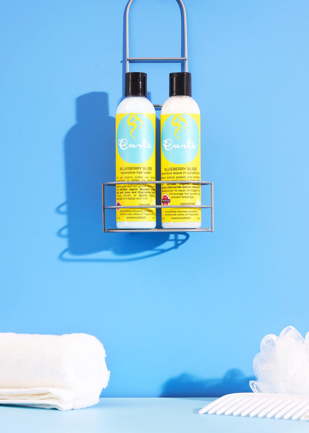 Curls Blueberry Bliss collection display highlighting nourishing options.