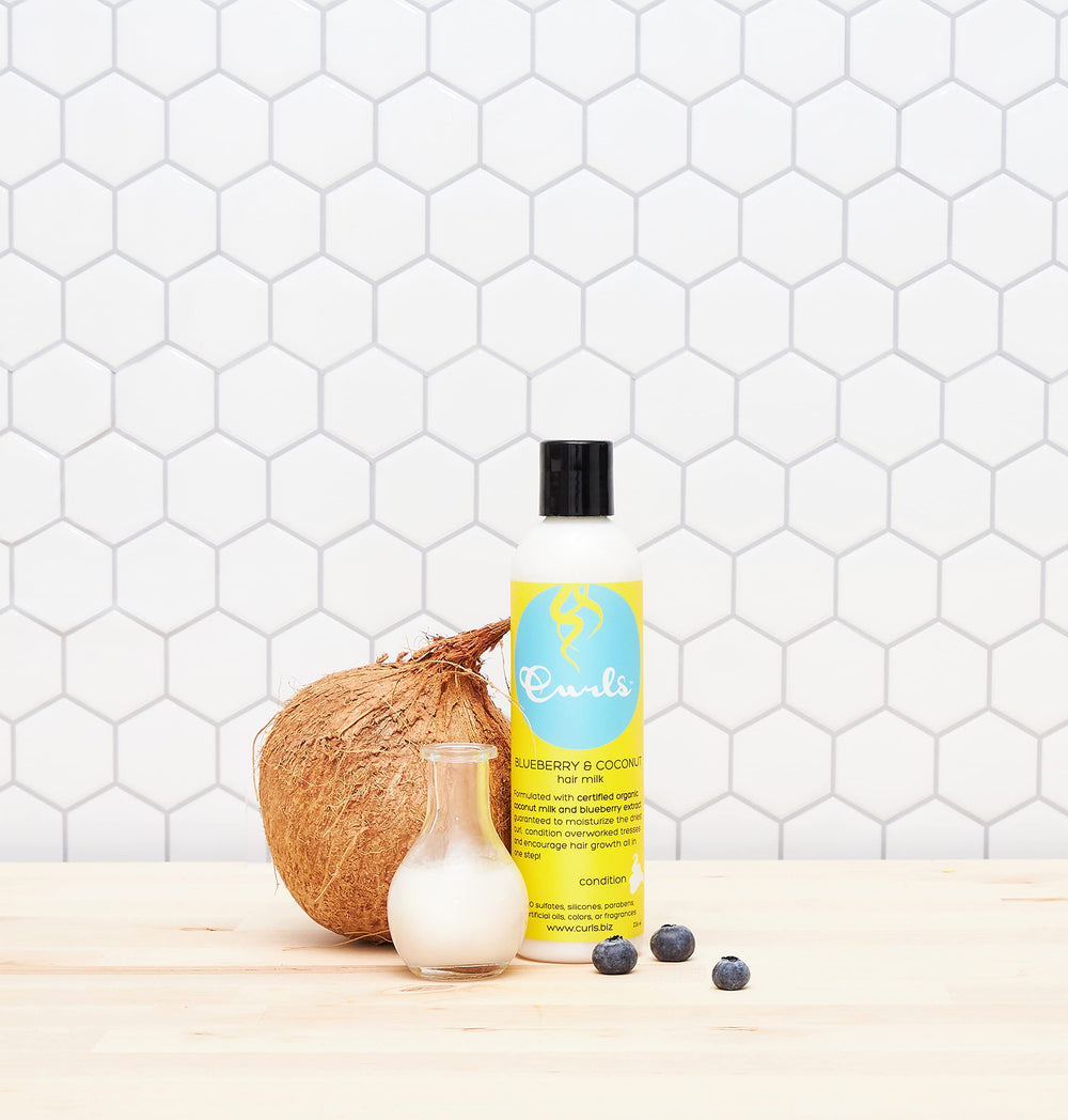 Ingredientes coco y arándano en Curls Blueberry Bliss para nutrición del cabello