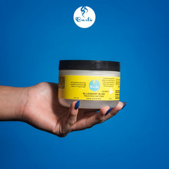 Textura crema de Curls Blueberry Bliss que suaviza y acondiciona rizos