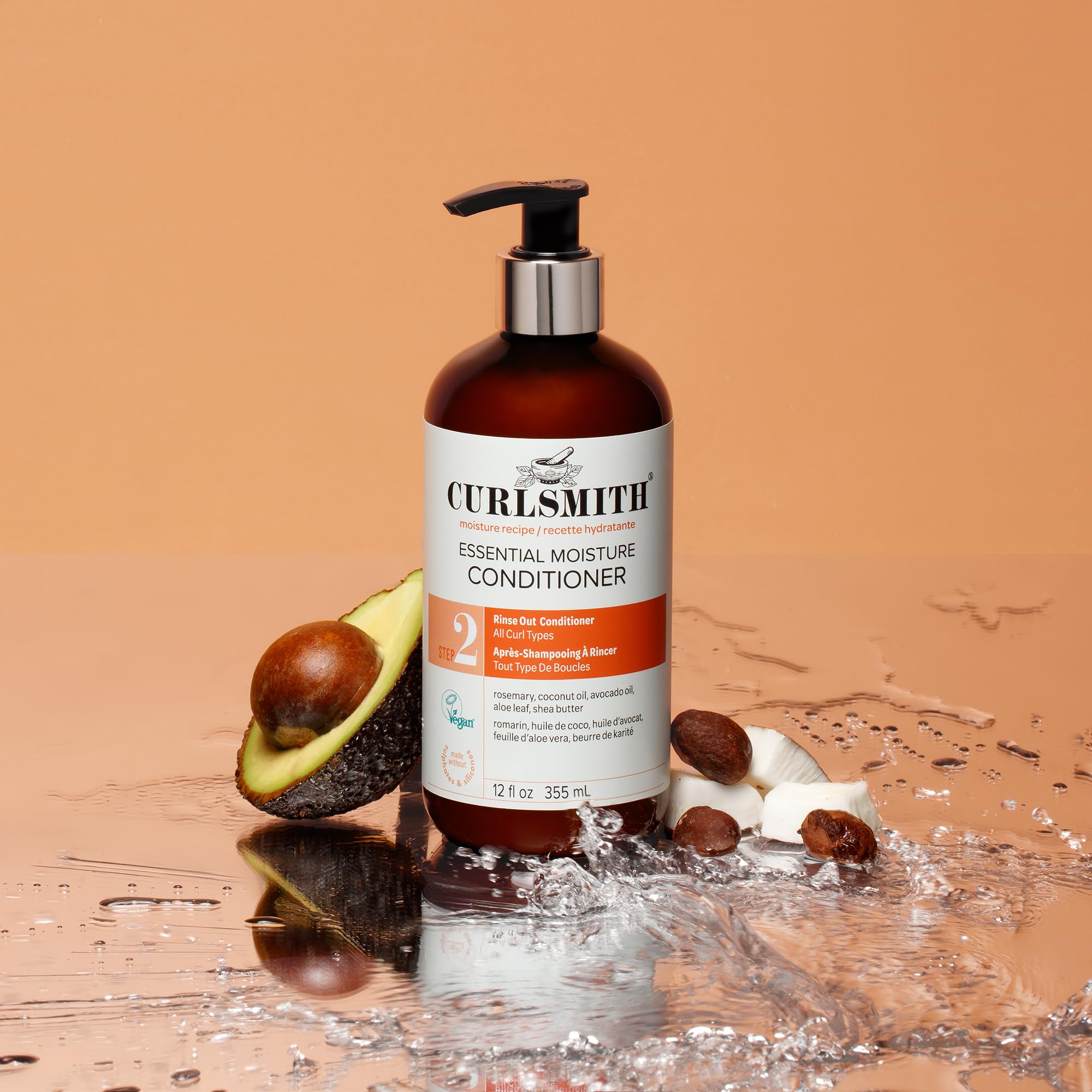 Wet hair application demonstrating lightweight moisture with CURLSMITH Essential Moisture Conditioner.