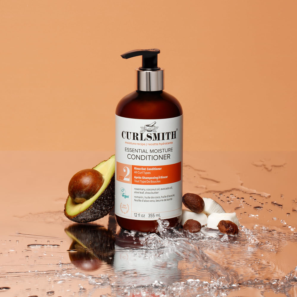 Wet hair application demonstrating lightweight moisture with CURLSMITH Essential Moisture Conditioner.