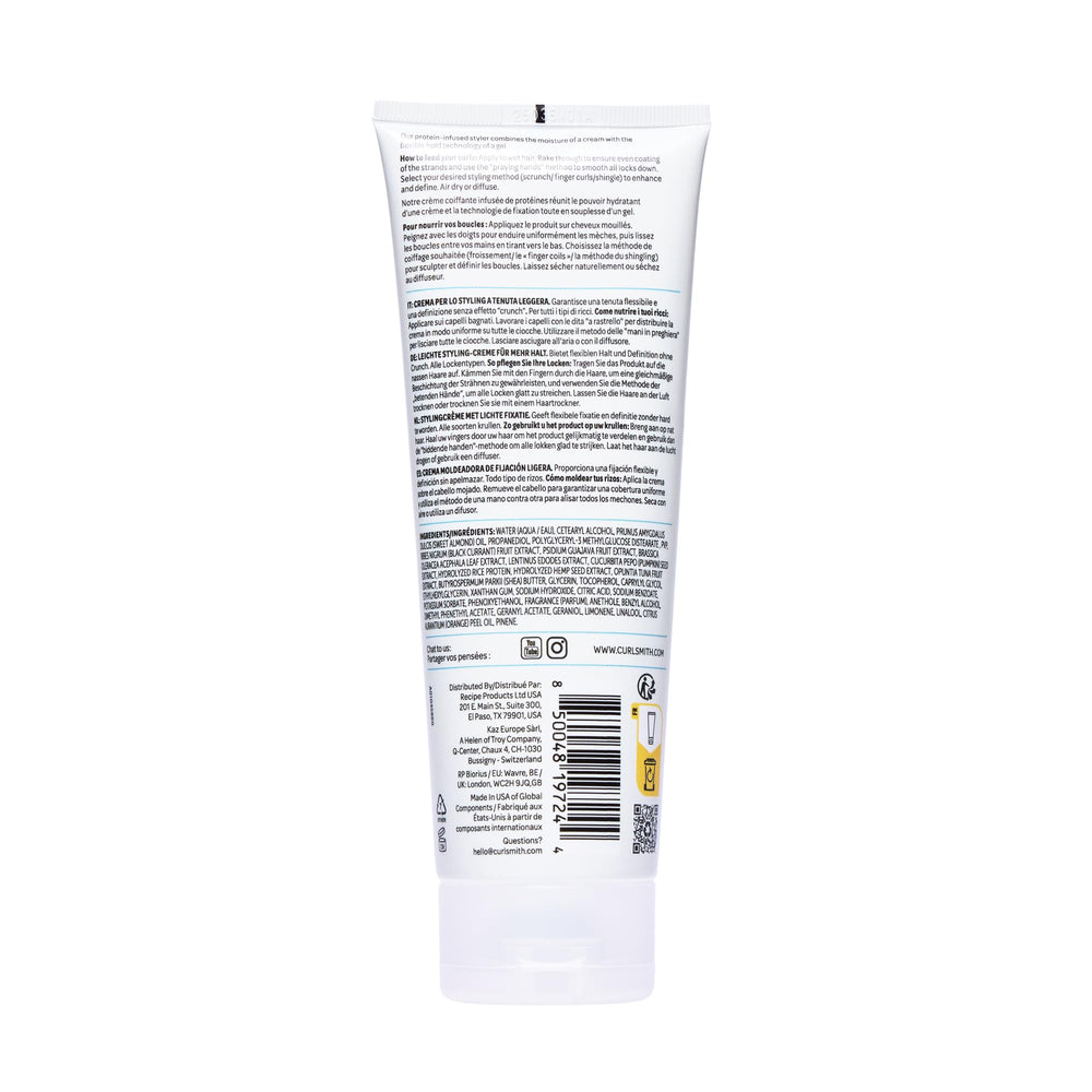 Layering CURLSMITH Protein Cream with gels for extra hold.