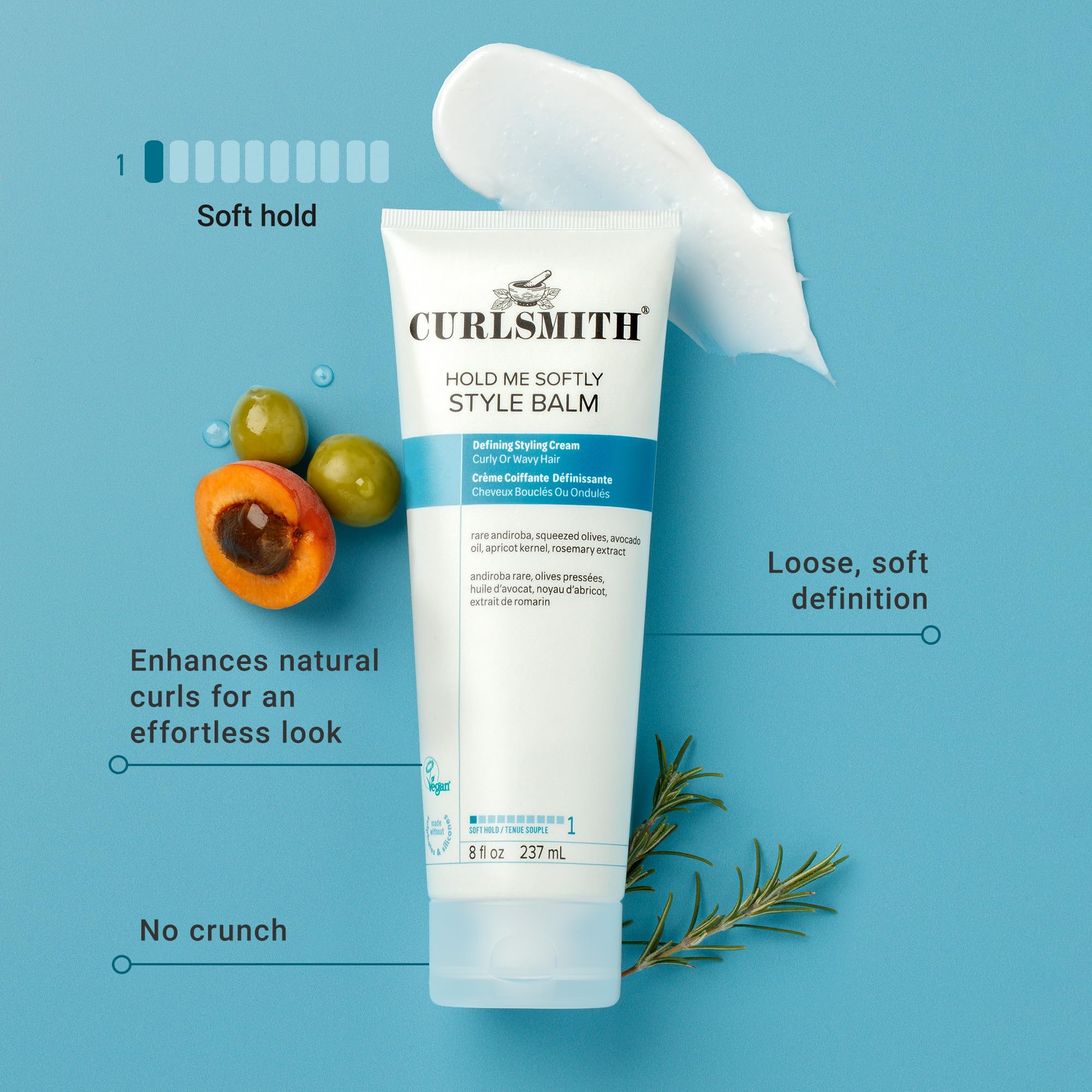 CURLSMITH Hold Me Softly Style Balm muestra textura sedosa en la palma para rizos.