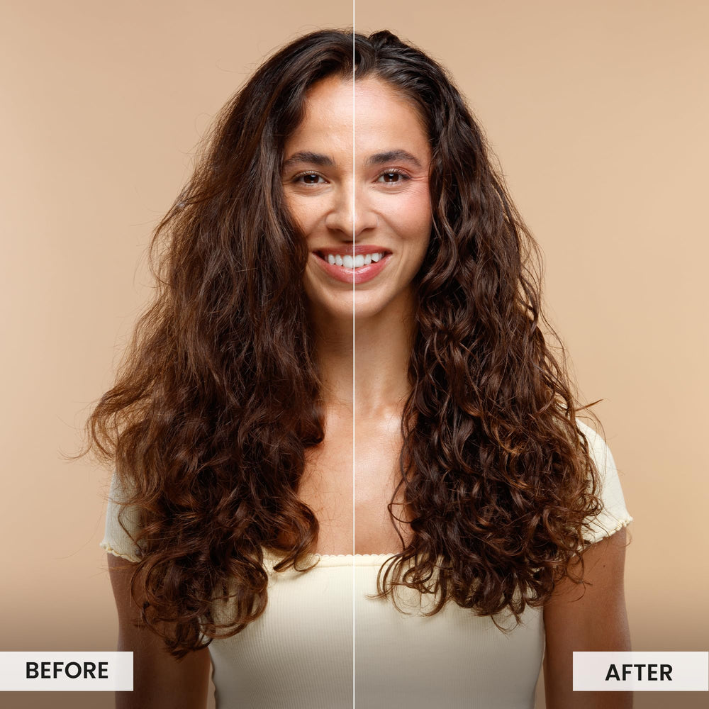 CURLSMITH Invincible Volume Mousse applied to wet hair for even distribution.