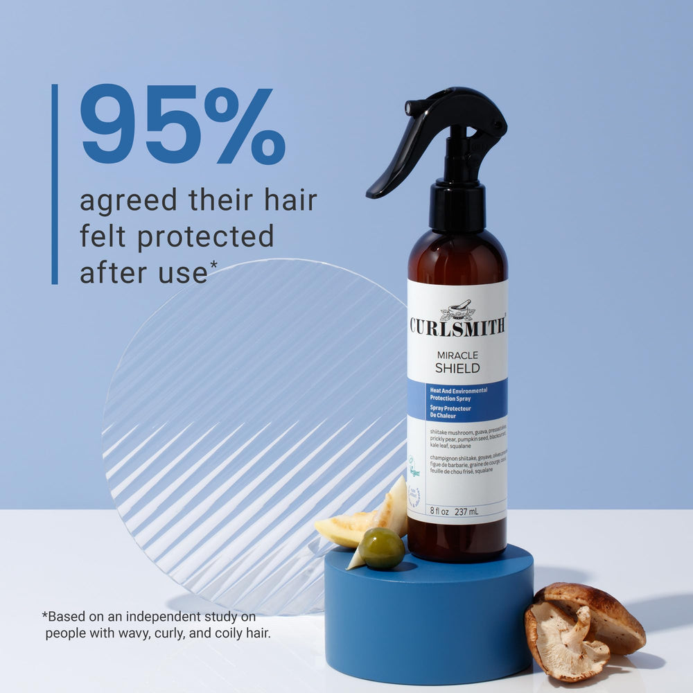 Salon-style shot of finished curls with Miracle Shield for frizz control.