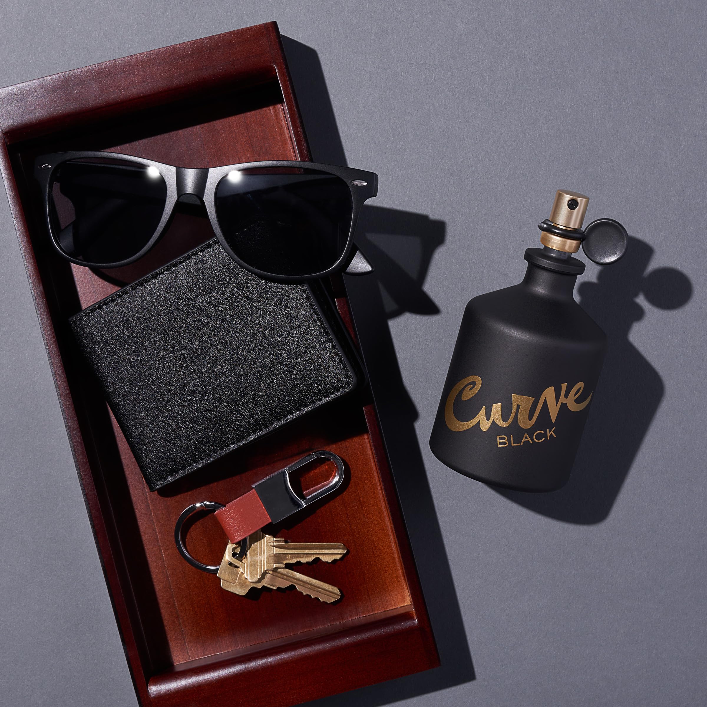 Curve Black bottle cap and label visible, premium detail