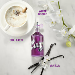 Curve Crush bottle with floral notes closeup, emphasizing chai latte and vanilla hints.