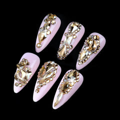 Cycullinyt pickup pen and tweezers aid quick, clean placement of tiny crystals.