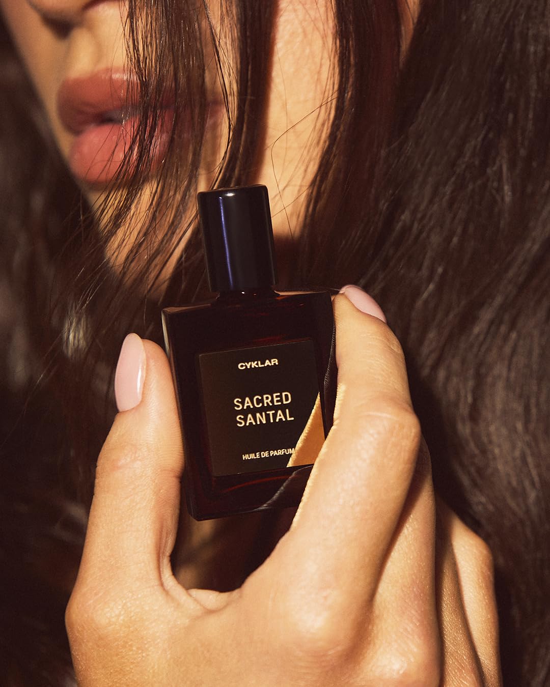 CYKLAR layering scent image encourages building a personalized fragrance profile.