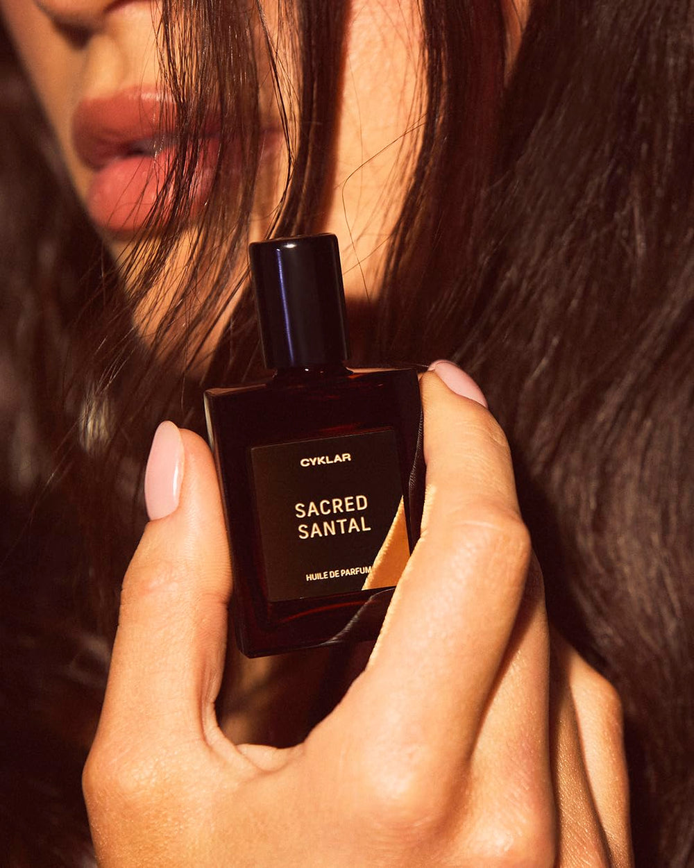 CYKLAR layering scent image encourages building a personalized fragrance profile.