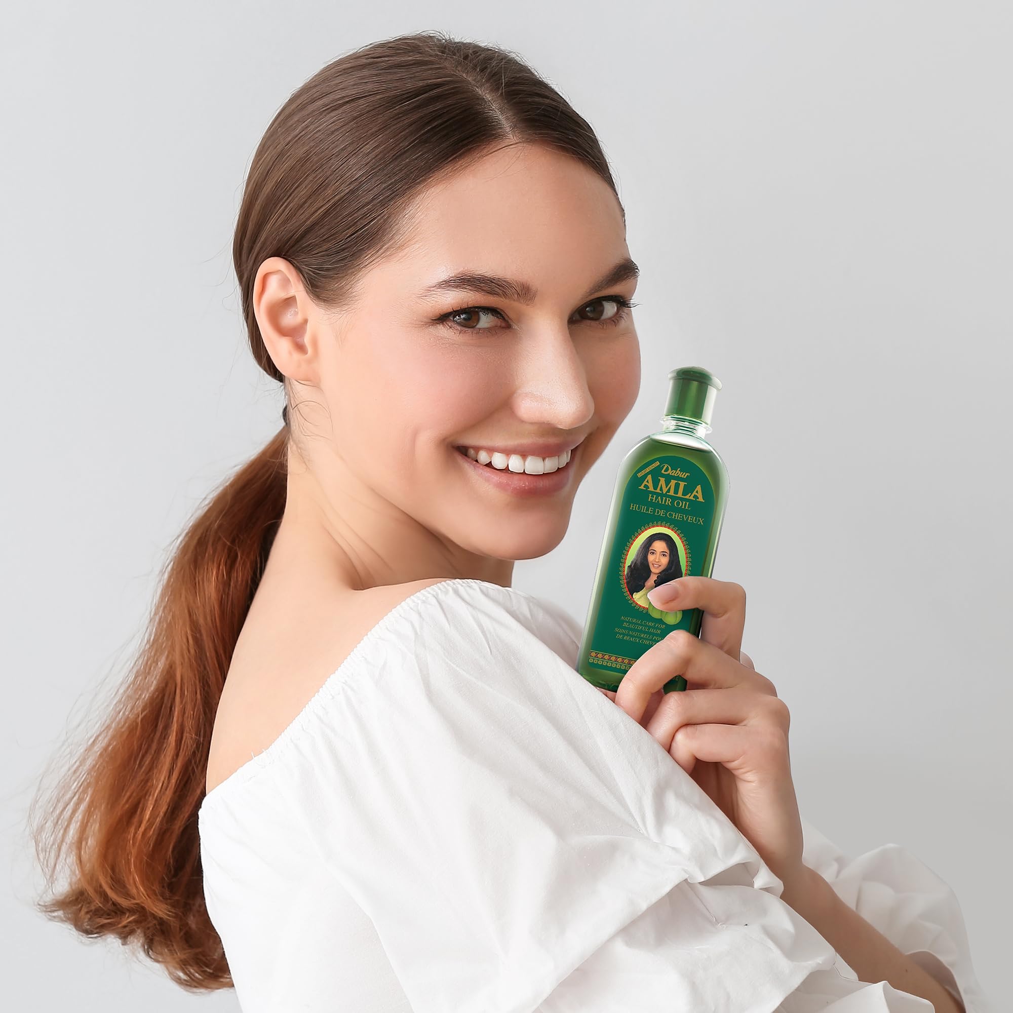 Cabello con brillo natural tras Dabur Amla Hair Oil