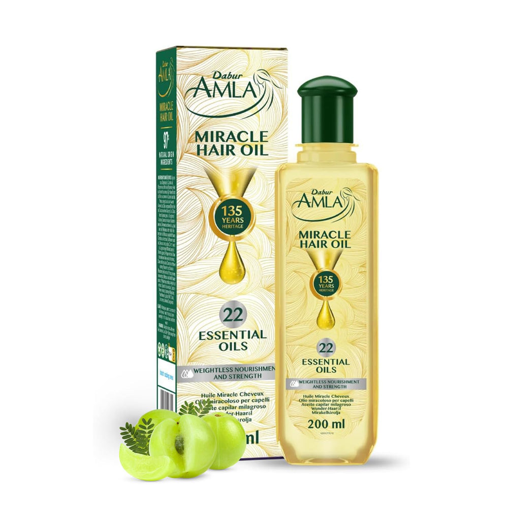 Dabur Amla Luxe Hair Oil bottle closeup highlighting premium Ayurvedic nourishment.