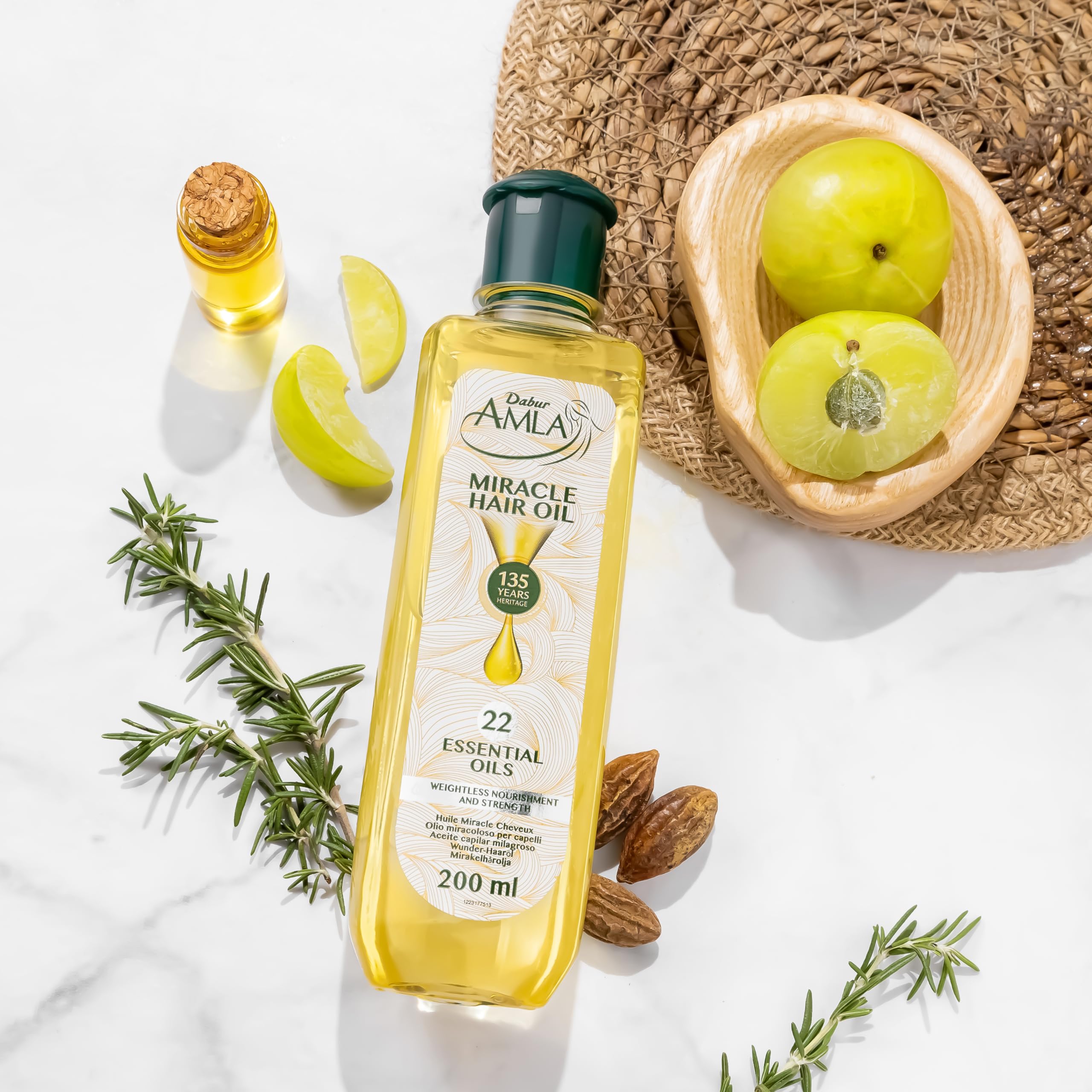Dabur Amla Luxe Hair Oil on dry hair demonstrating frizz control and shine.
