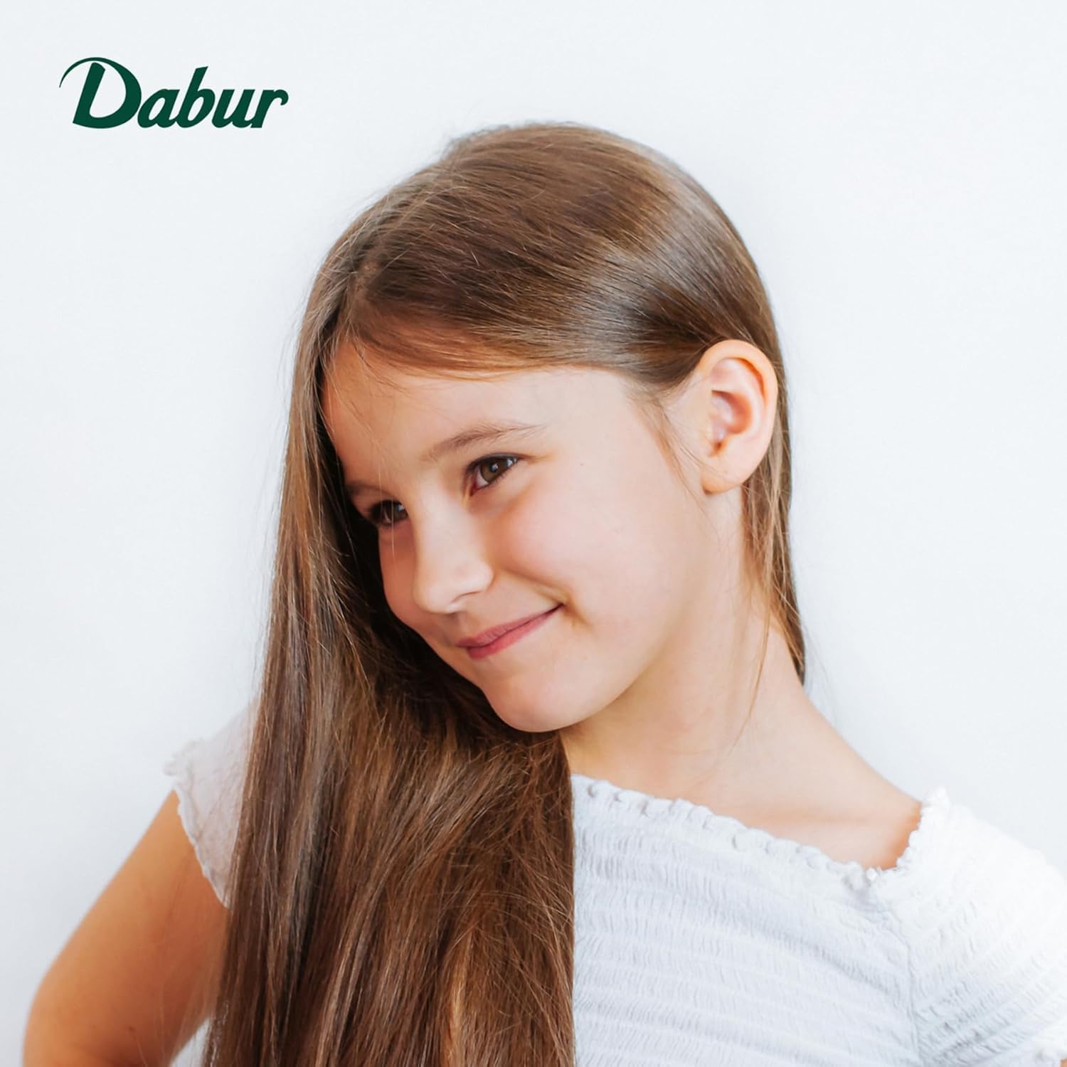 Dabur Amla Niños: aplicación fácil para una rutina de peinado.