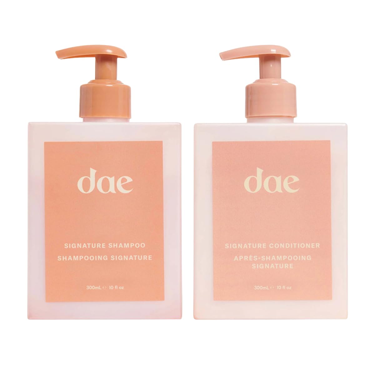 DAE Signature Shampoo bottle close-up highlighting rich cleansing lather for all hair types.