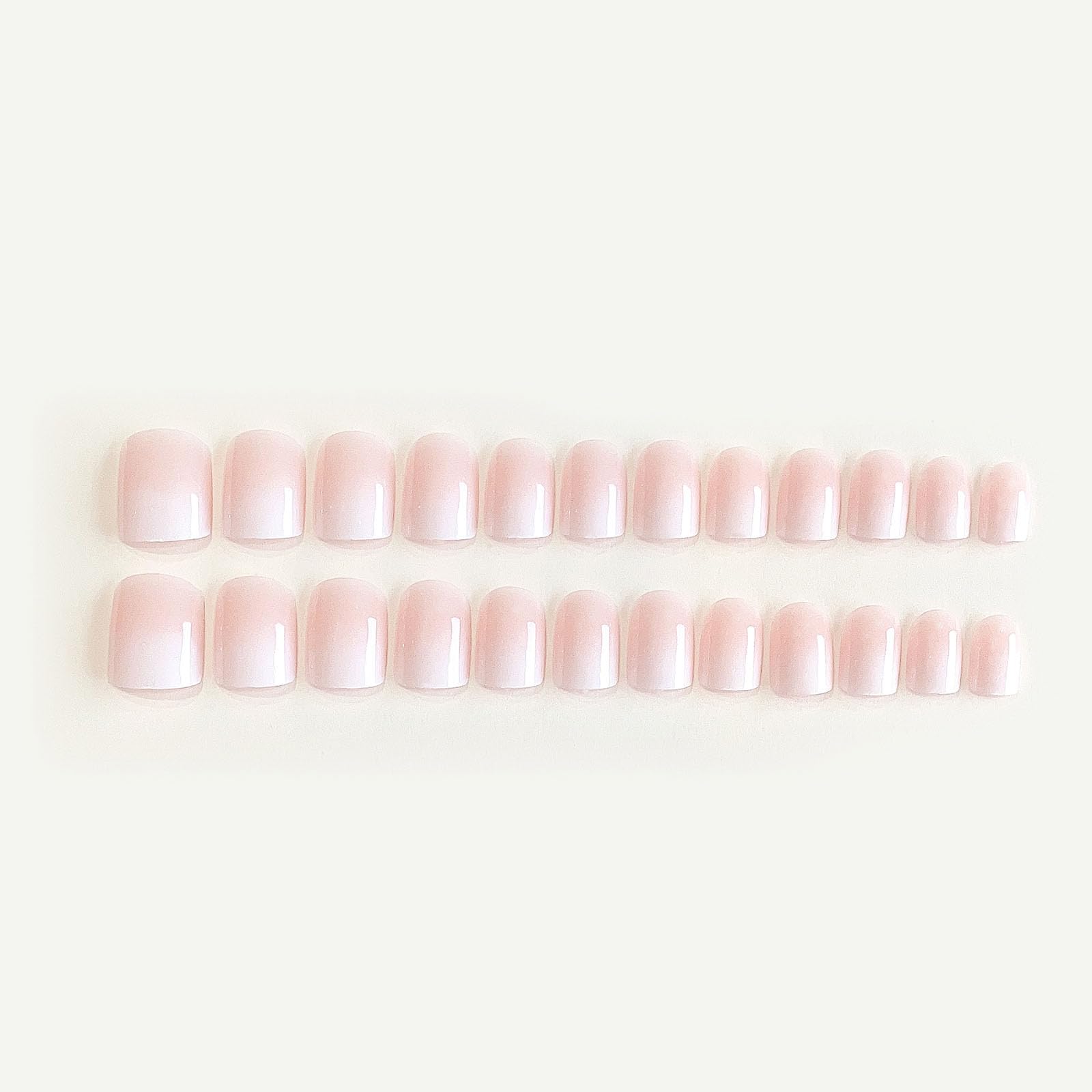 DANMANR nails close-up showing white pink French tips for a chic look