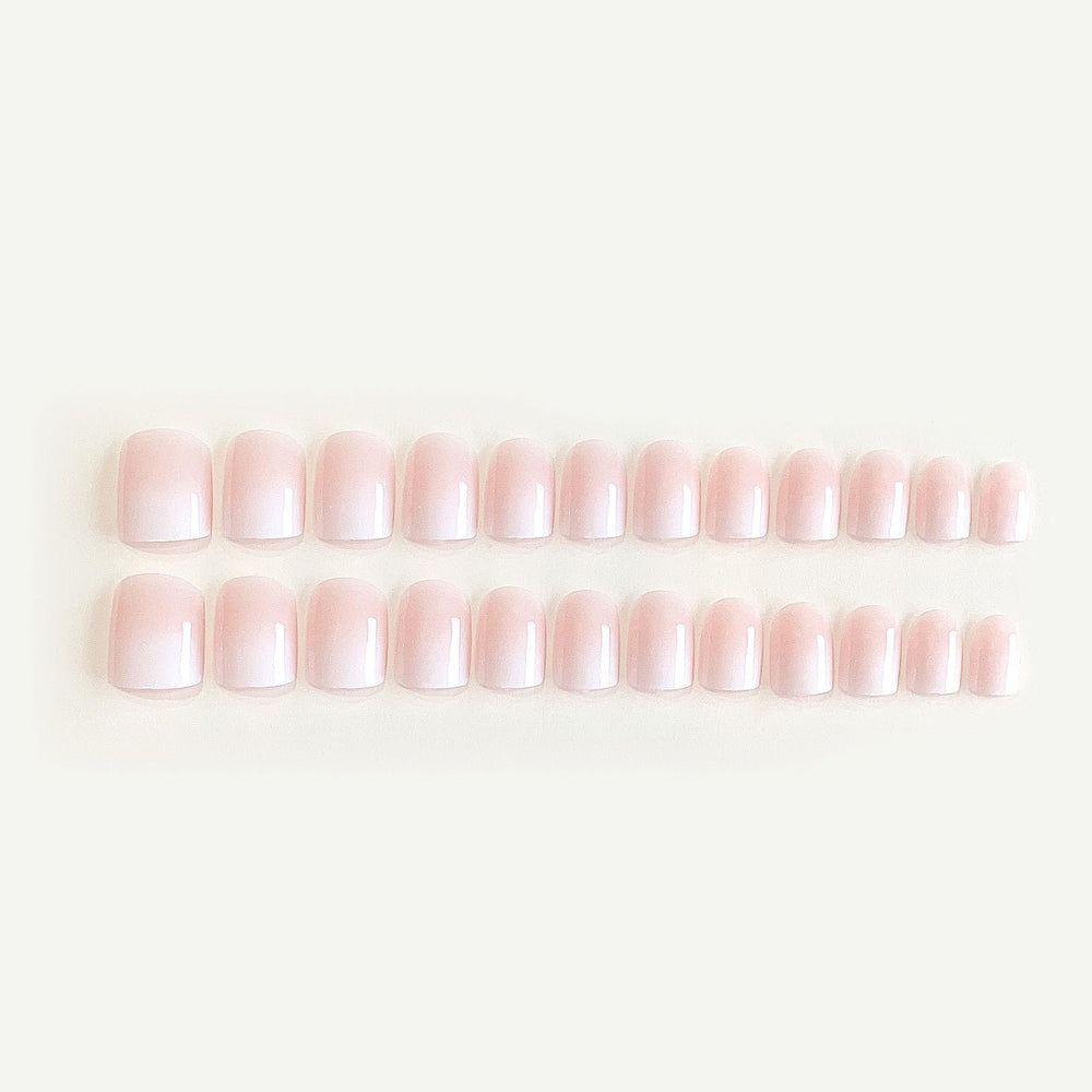 DANMANR nails close-up showing white pink French tips for a chic look