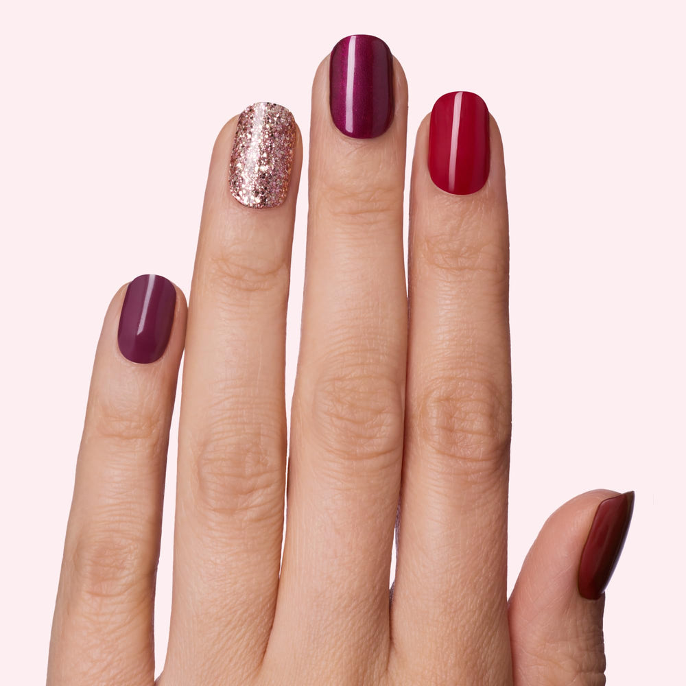 Dashing Diva Gloss best-of-reds wraps spread for quick manicure application.
