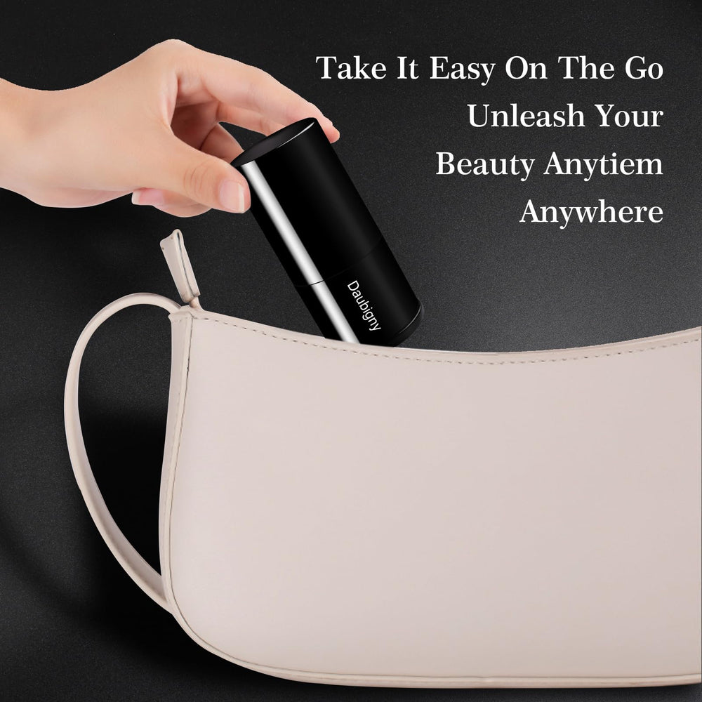 Daubigny retractable kabuki brush with soft bristles for even powder application.