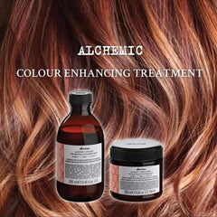Davines Alchemic Copper conditioner applied to damp hair to refresh color.