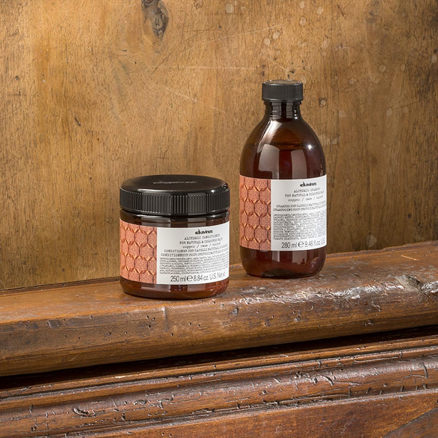In-use shot showing application on damp hair after shampoo.