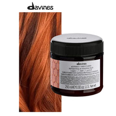Close-up of Davines Alchemic Copper packaging showing copper hues for vibrant red.