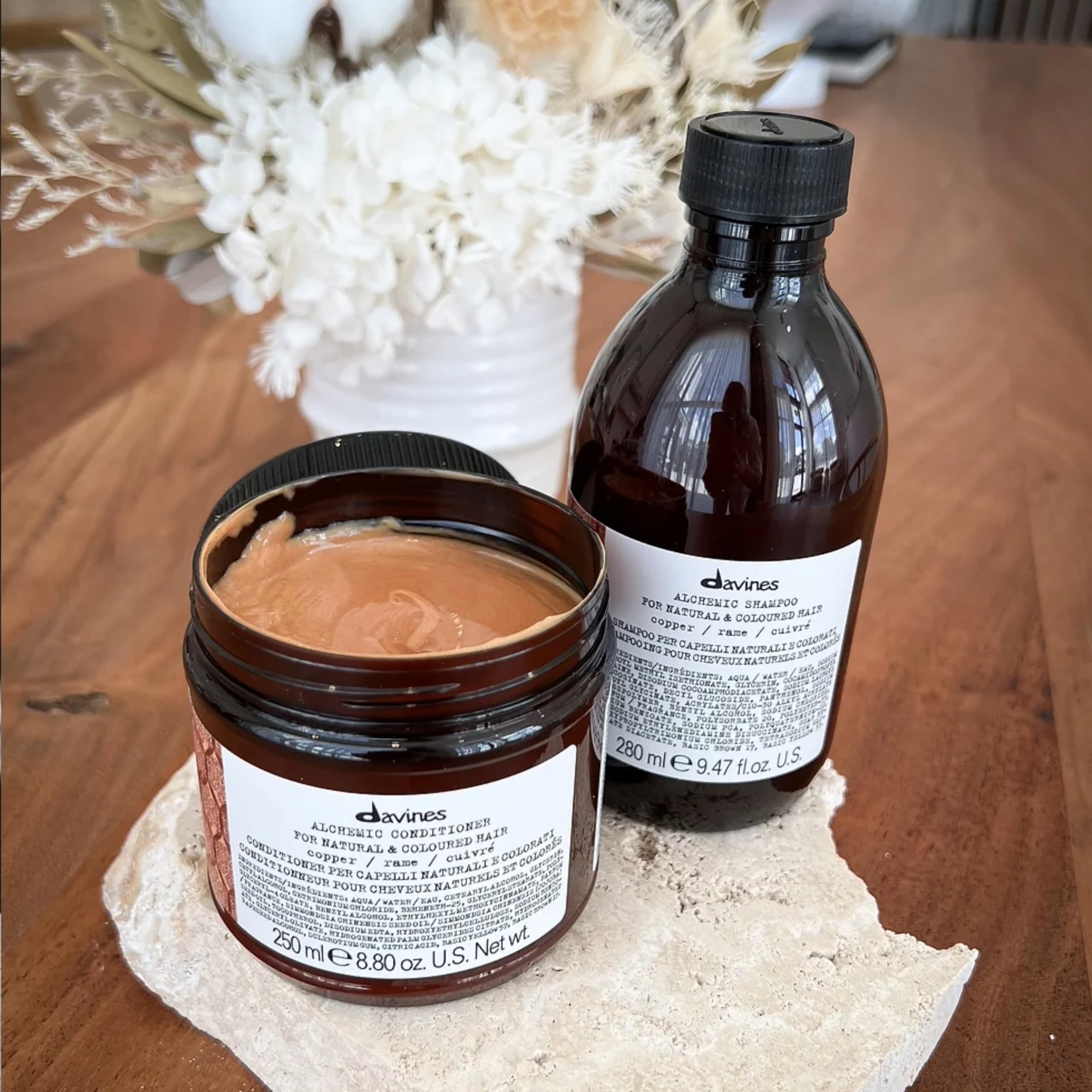 Creamy formula swirls on hair, enriching copper tones.