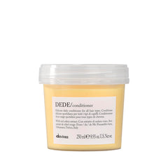 Davines DEDE conditioner bottle pour shows lightweight daily conditioning for fine hair.