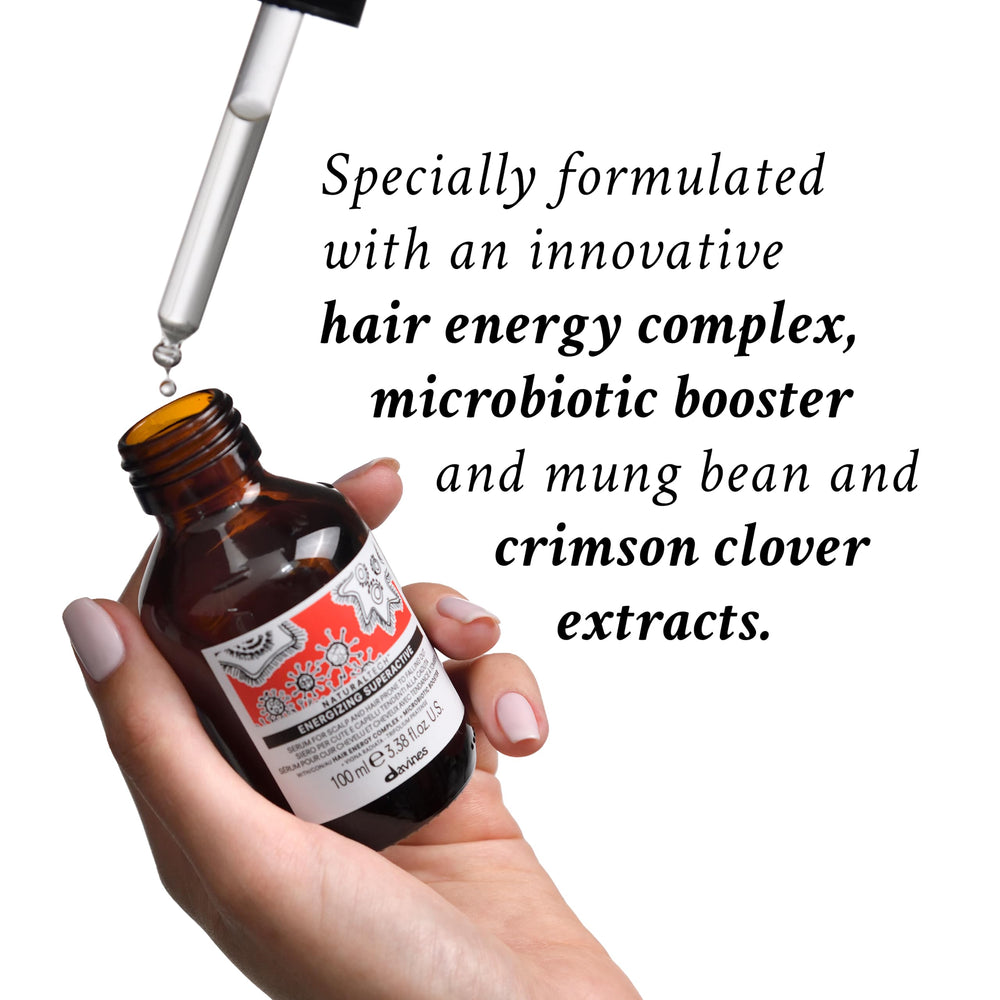 Davines Energizing Superactive Serum label highlights caffeine phytoceuticals for vitality.
