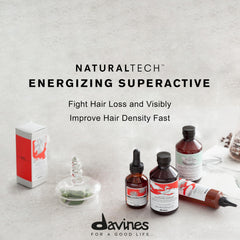 Davines Energizing Superactive Serum pump demonstrates easy scalp application.
