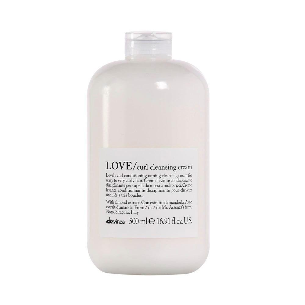Davines LOVE Curl Cleansing Cream bottle pour shows light cleansing for soft, defined curls.