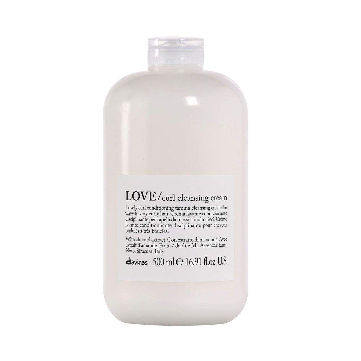 Davines LOVE Curl Cleansing Cream bottle pour shows light cleansing for soft, defined curls.
