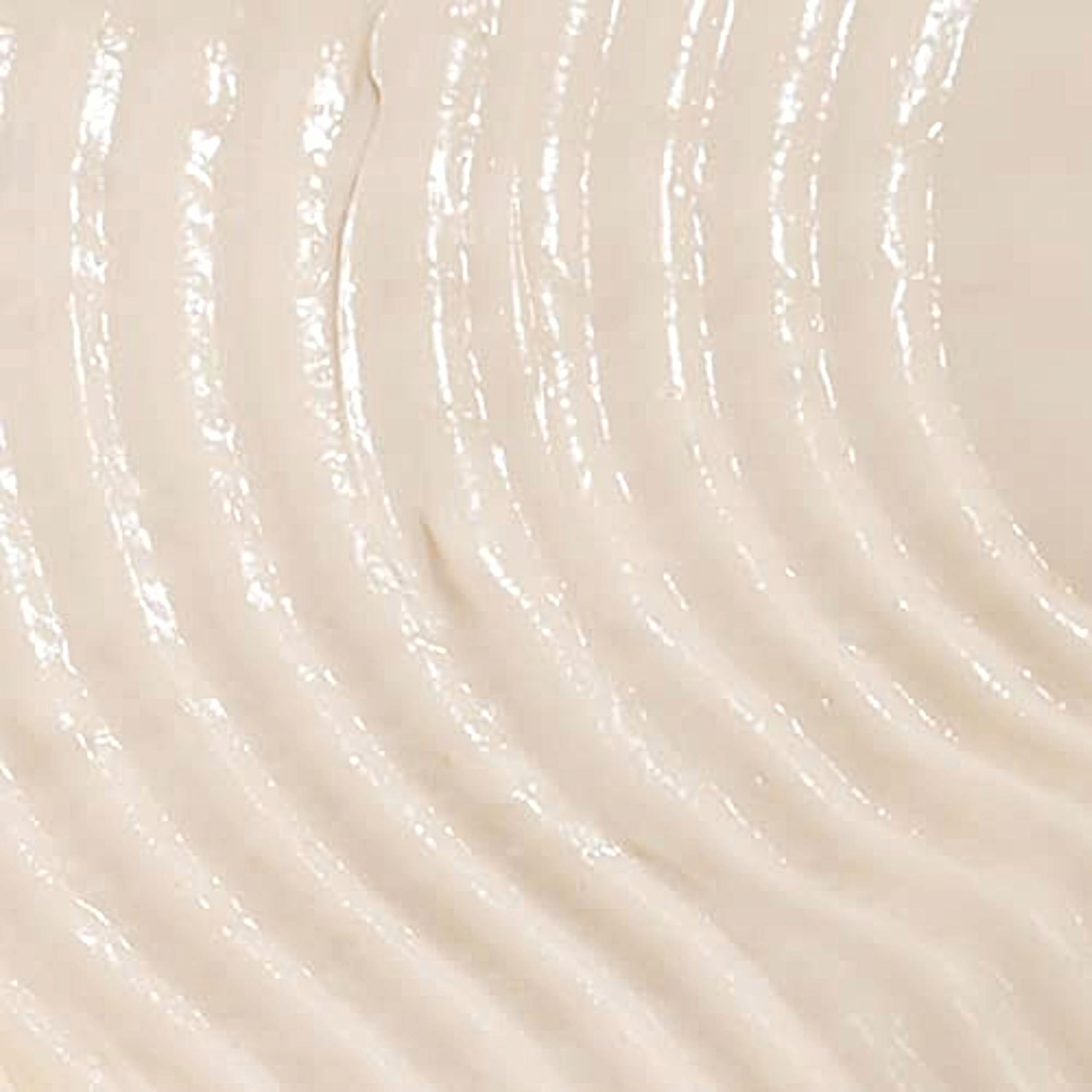 Damp hair application of Davines LOVE Curl Cleansing Cream distributes evenly.