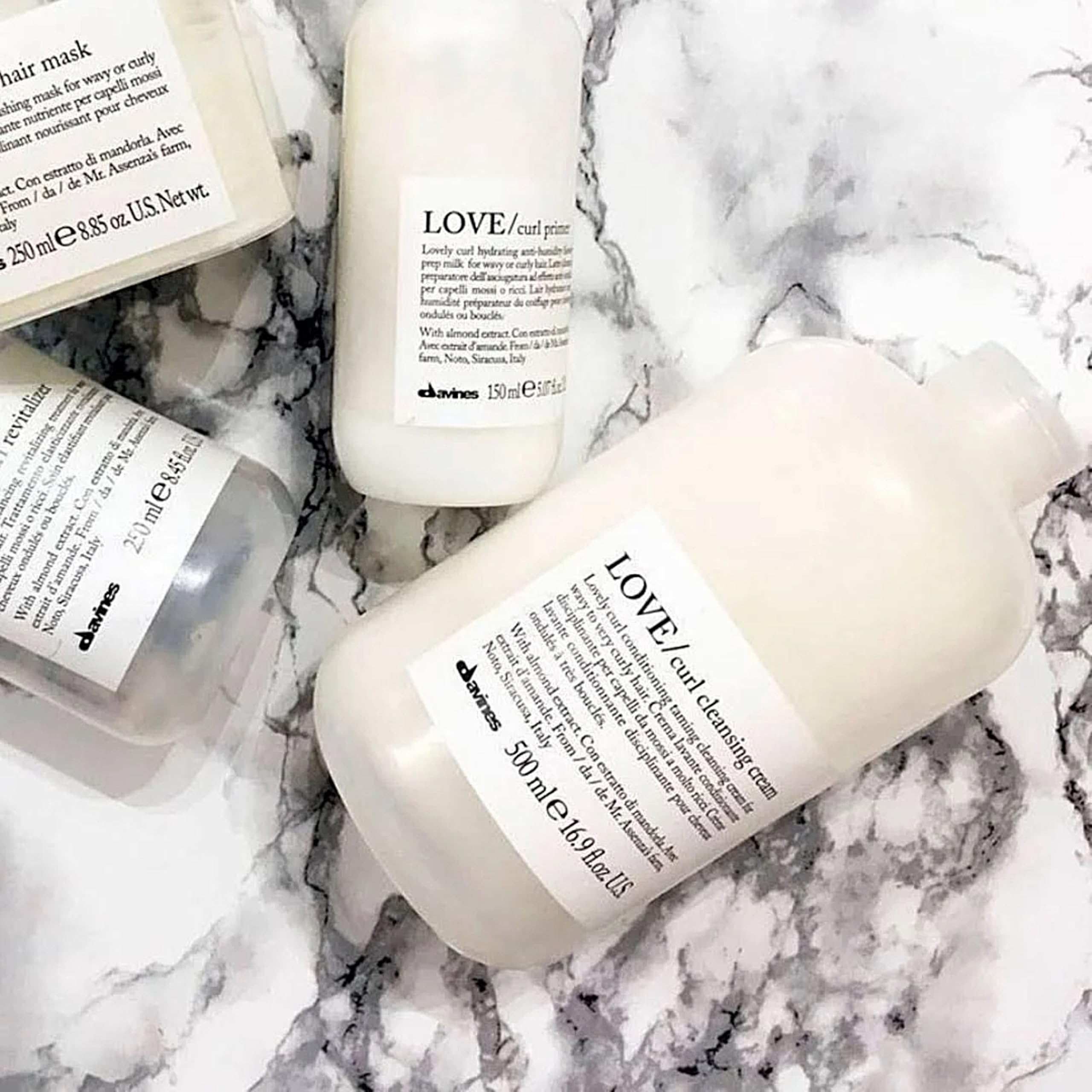 Davines LOVE Curl Cleansing Cream close-up lather demonstrates gentle cleansing.