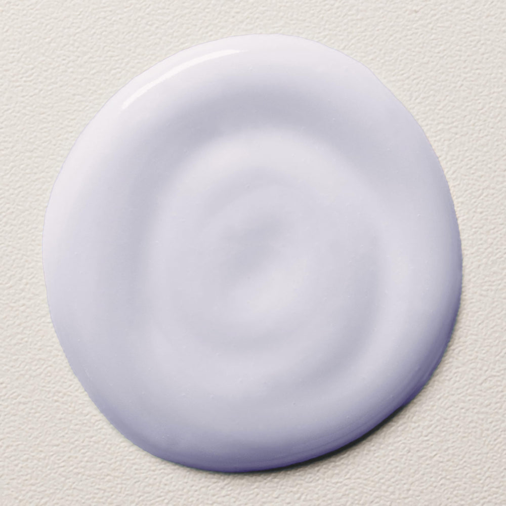 Davines LOVE serum on towel-dried hair demonstrates lightweight moisture for frizz control.