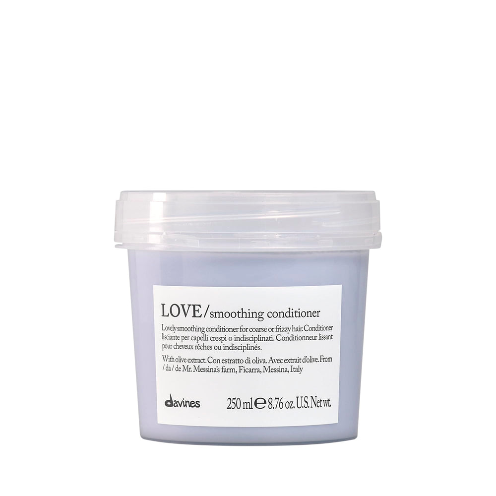 Davines Love Smoothing Conditioner bottle ready to tame frizz