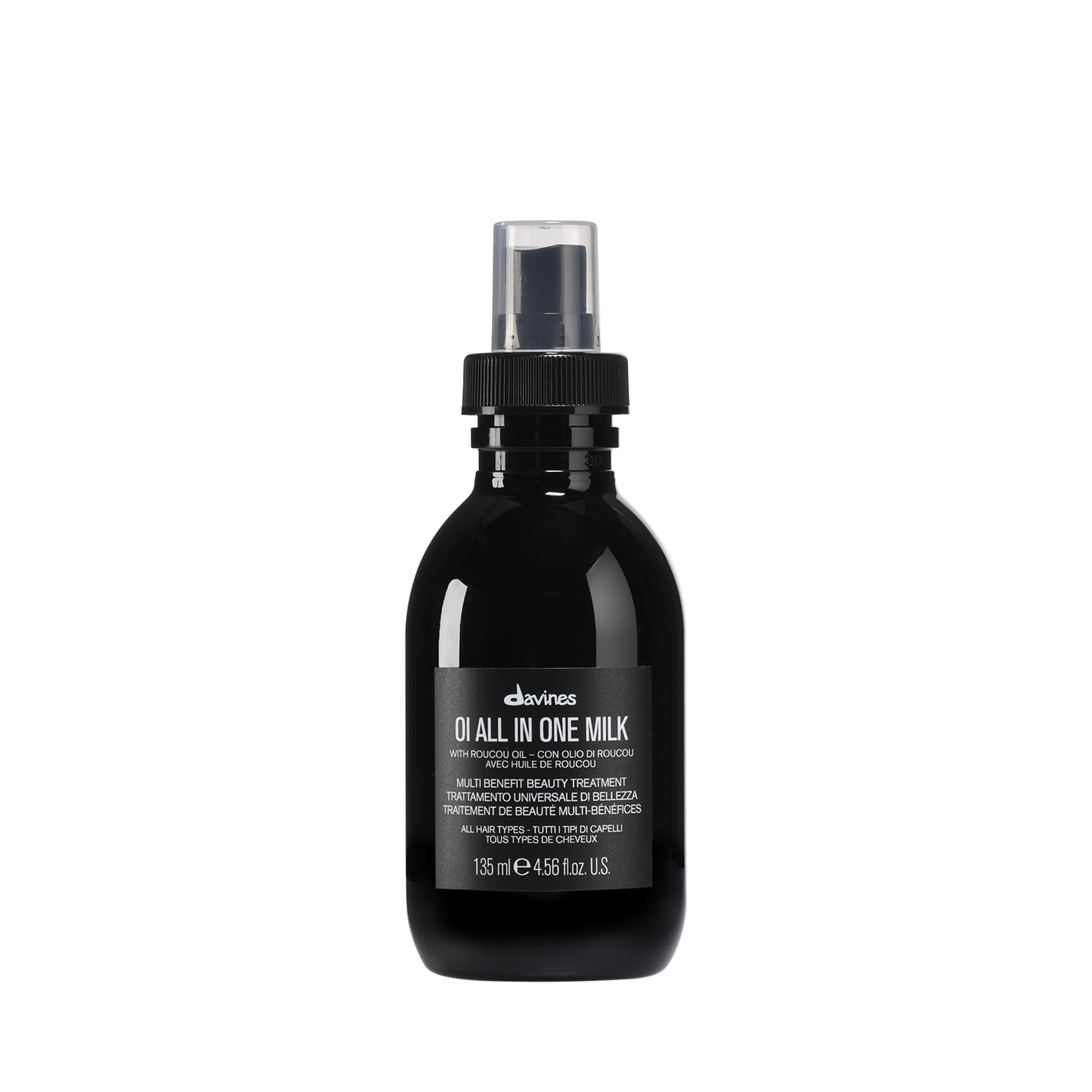 Davines OI All-In-One Milk bottle pour highlights easy detangling and shine.