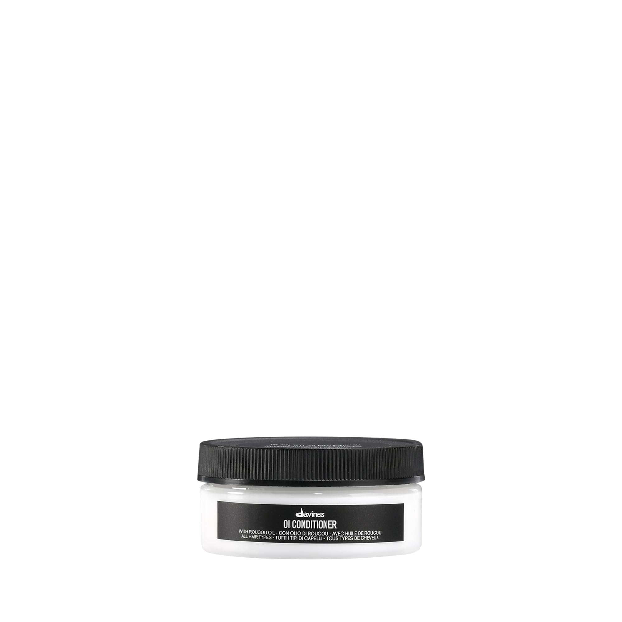 Davines OI Condicionador, botella elegante para suavizar y desenredar el cabello.