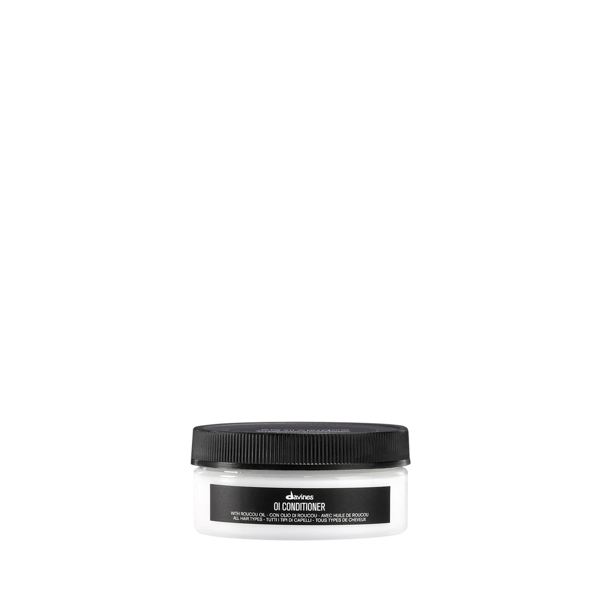 Davines OI Condicionador, botella elegante para suavizar y desenredar el cabello.