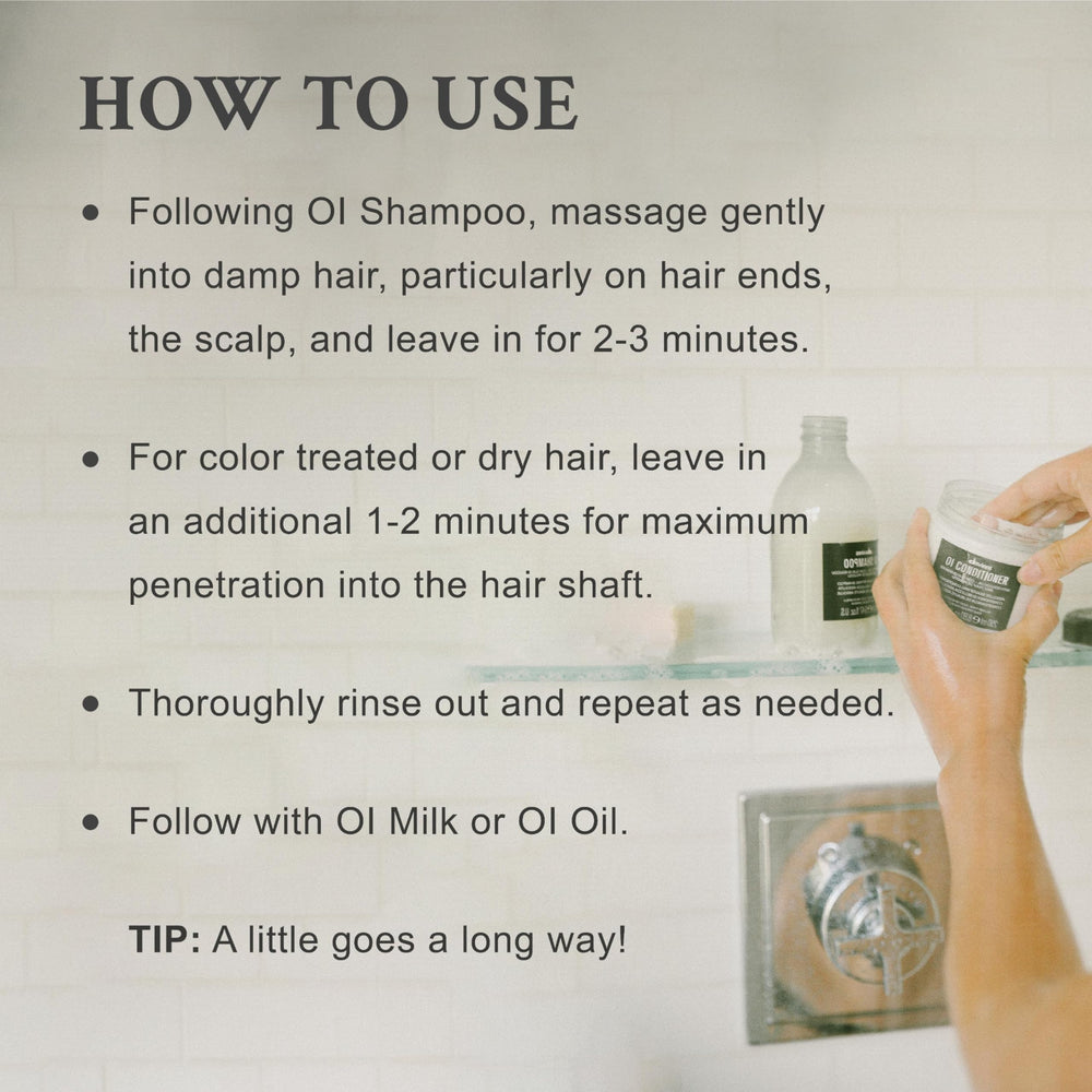 Davines OI Conditioner apply hair section demonstrates easy distribution
