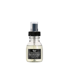 Davines OI Oil bottle pour showcases a weightless shine booster for all hair types.