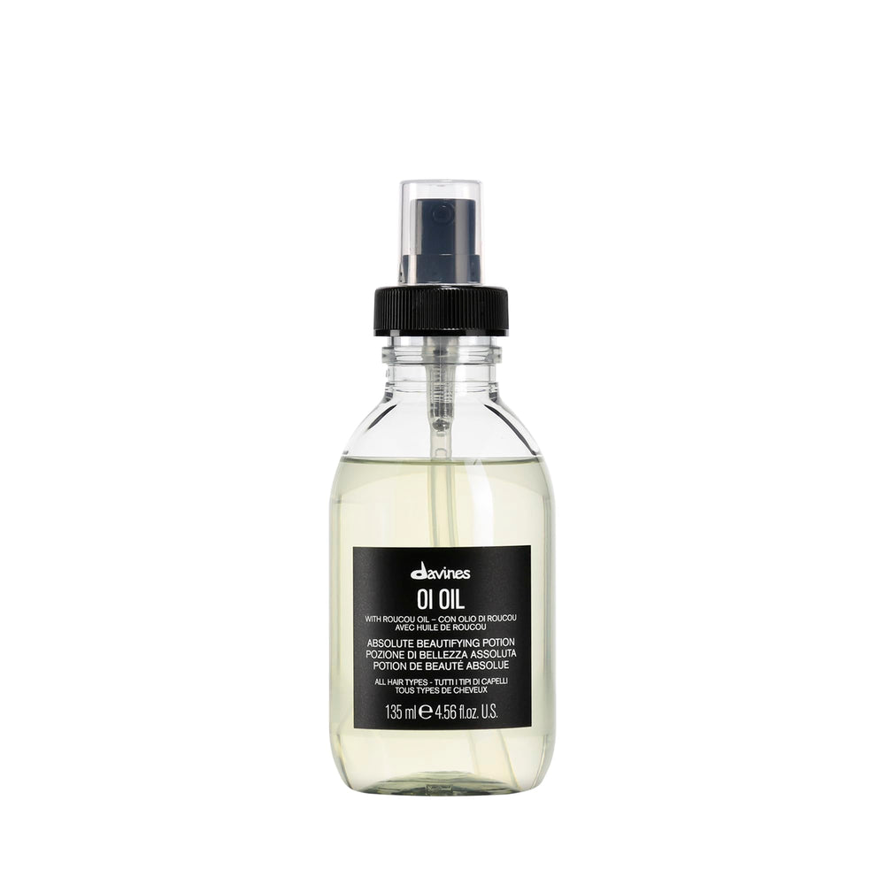 Davines OI Oil bottle with pump for lightweight shine and smooth application.