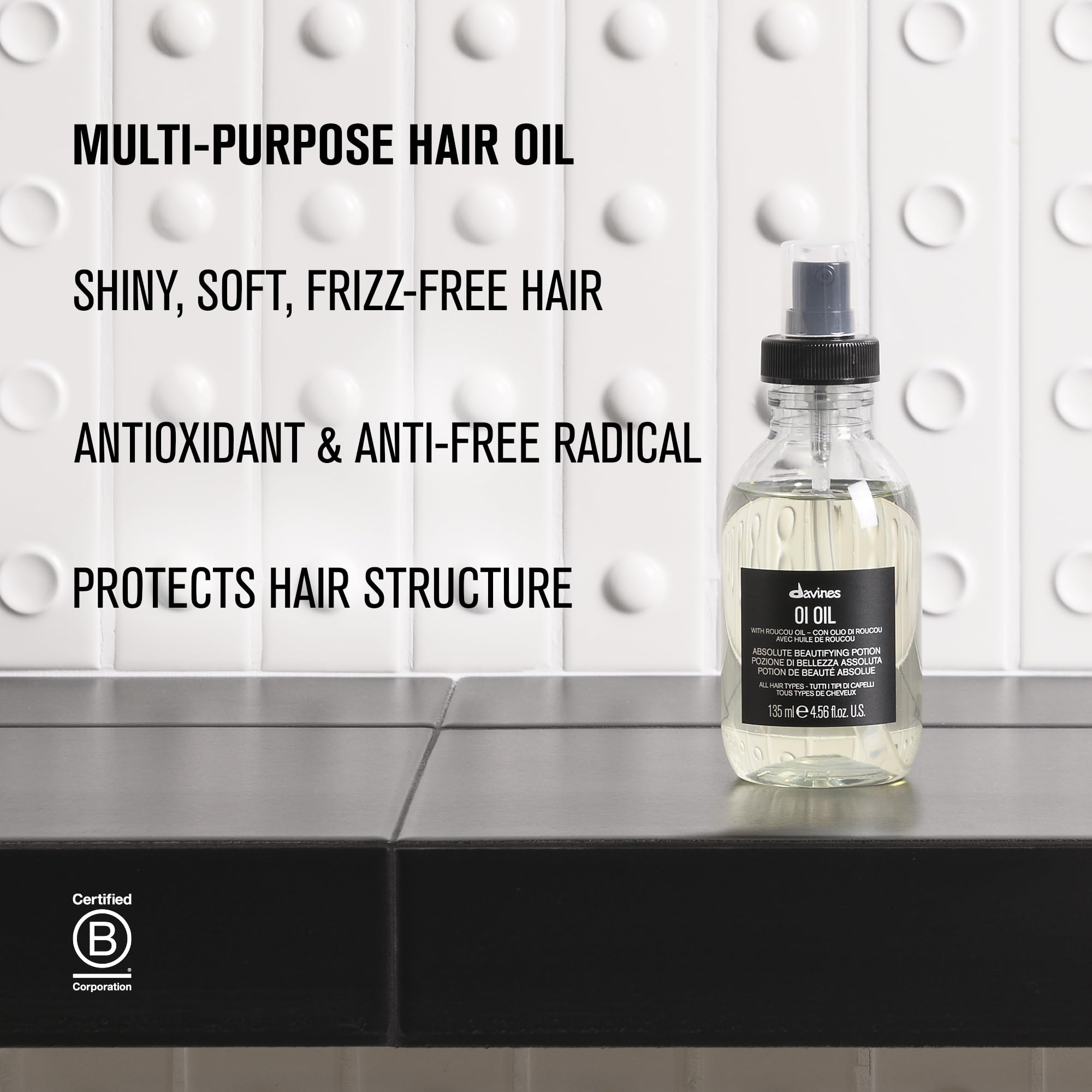 Davines OI Oil adds soft shine to curly hair.