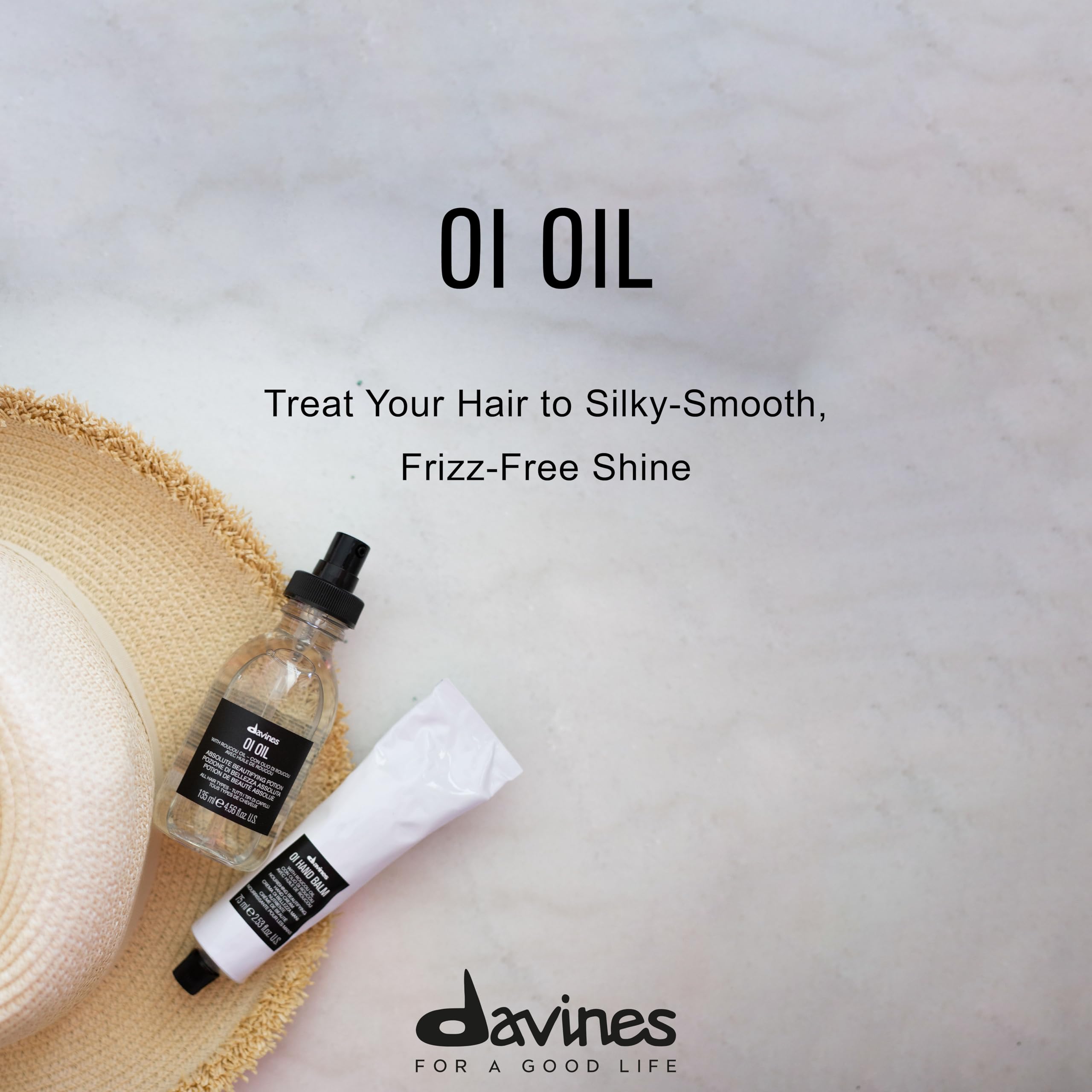 Close-up of Davines OI Oil dispensing pump for easy control.