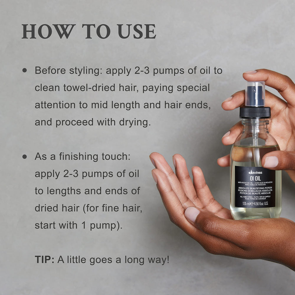 Davines OI Oil on dry hair for finishing shine and hydration.